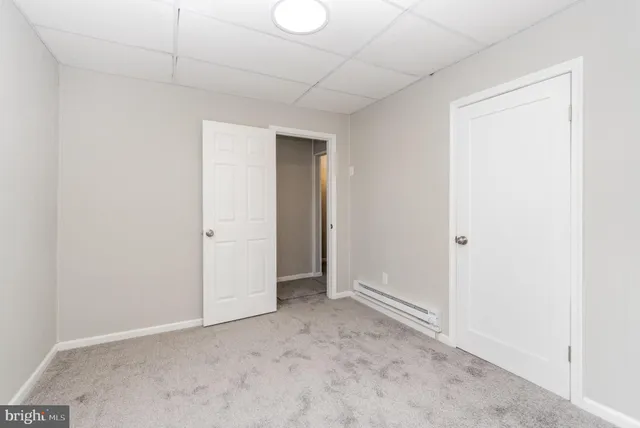 an empty room with closet