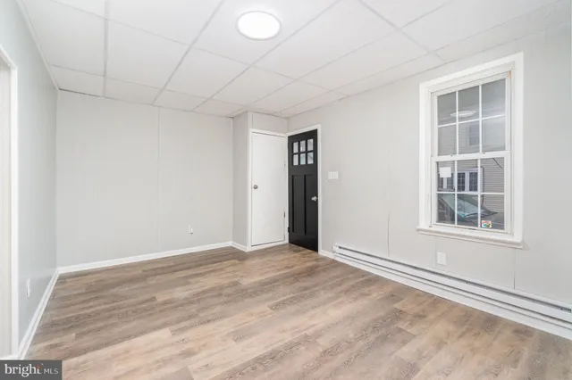 an empty room with windows