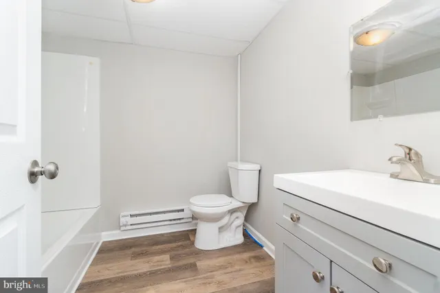 a bathroom with a sink and a toilet
