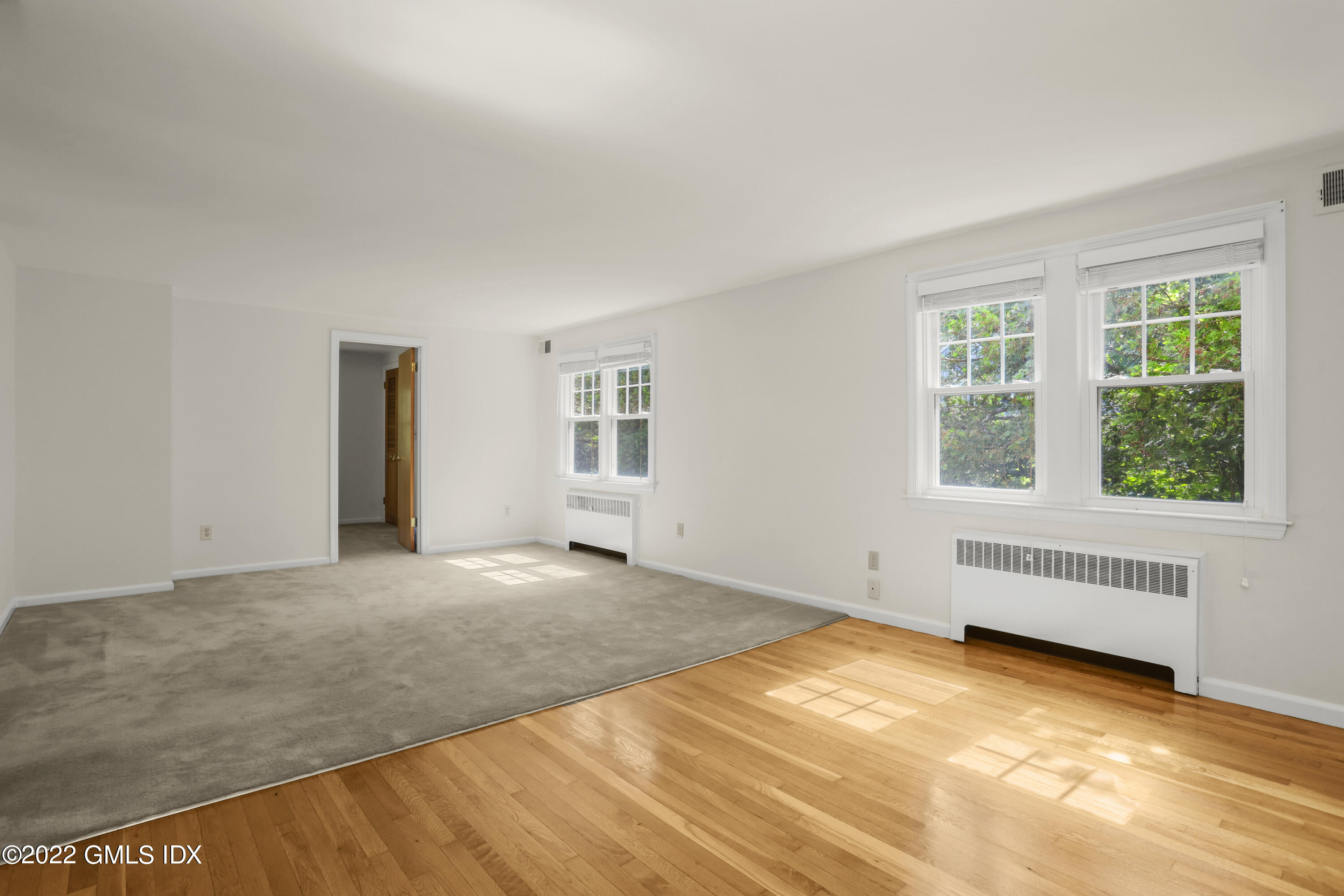261 Pemberwick Road Greenwich, CT 06831 - Photo 7 of 13 a view of an empty room with a window