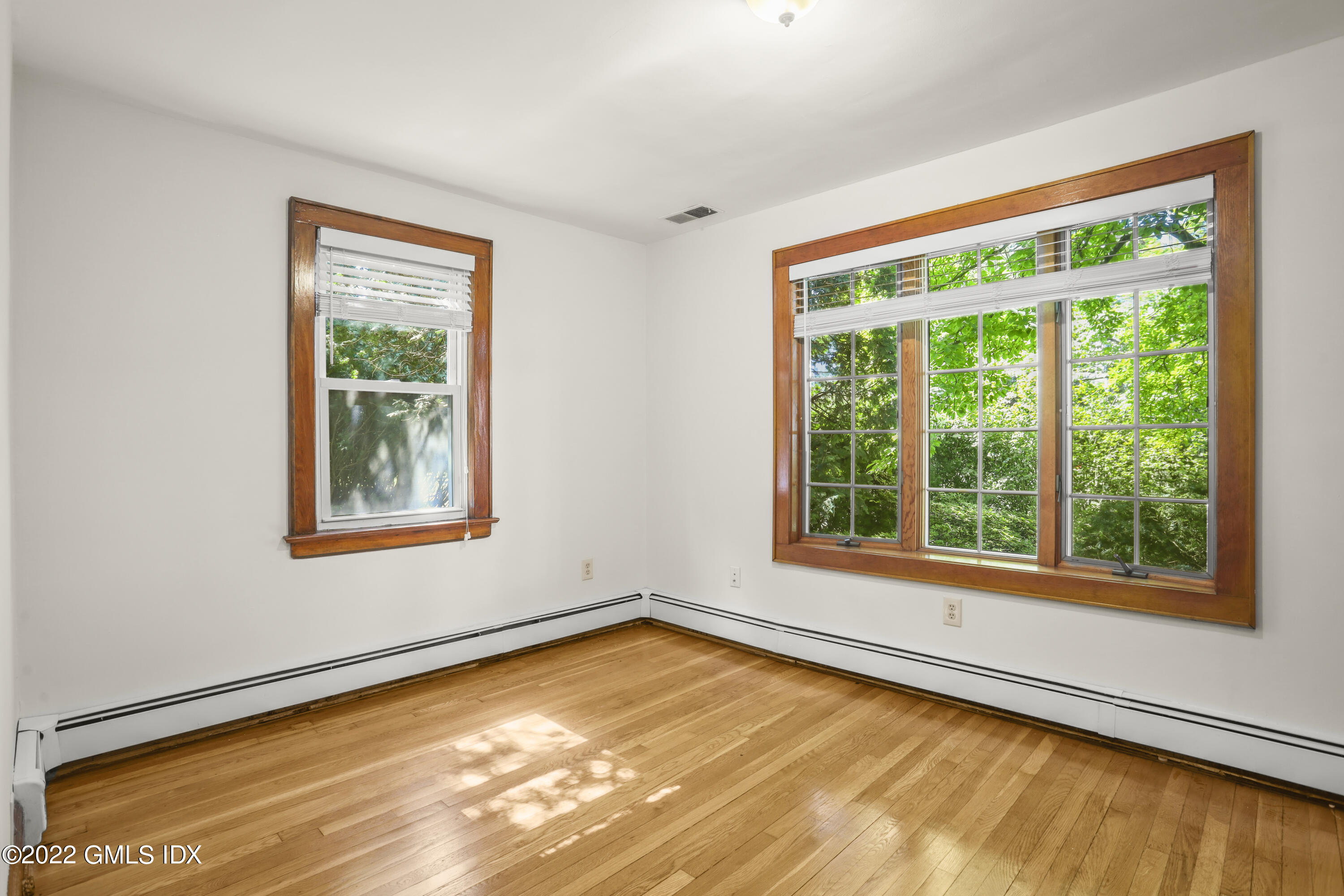 261 Pemberwick Road Greenwich, CT 06831 - Photo 8 of 13 a view of an empty room with a window