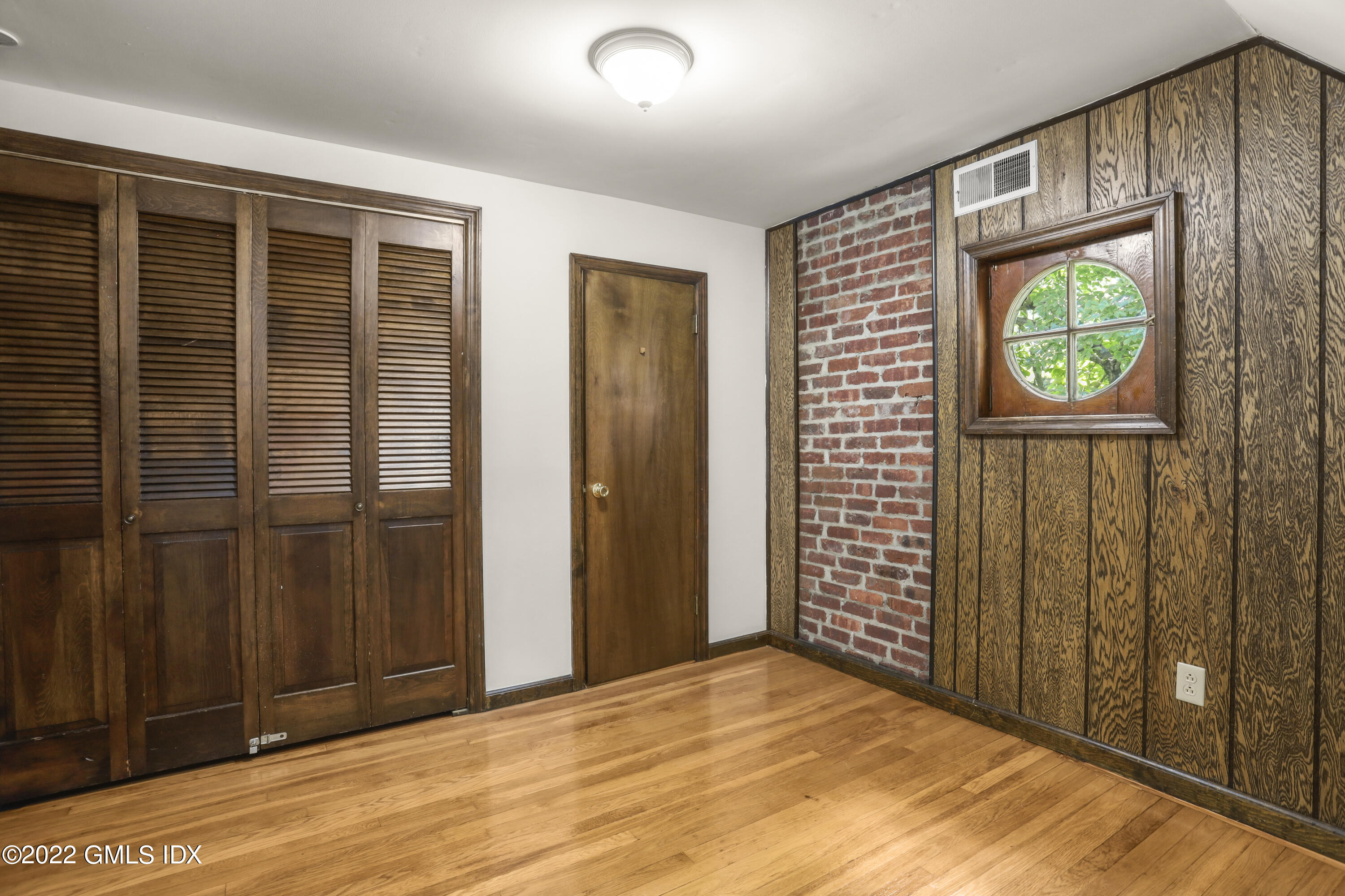 261 Pemberwick Road Greenwich, CT 06831 - Photo 10 of 13 a view of an entryway with wooden floor