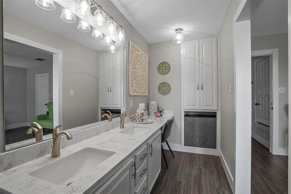 5113 Mountain Spring Trail Fort Worth, TX 76123 - Photo 28 of 35 Bathroom featuring double vanity and dark wood-style flooring