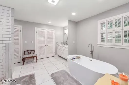 a bathroom with a toilet and a sink