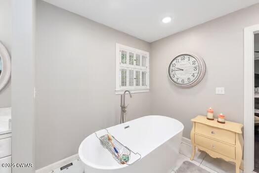 562 Old Jackson Road Henderson, TN 38340 - Photo 21 of 42 a bathroom with a toilet and a sink