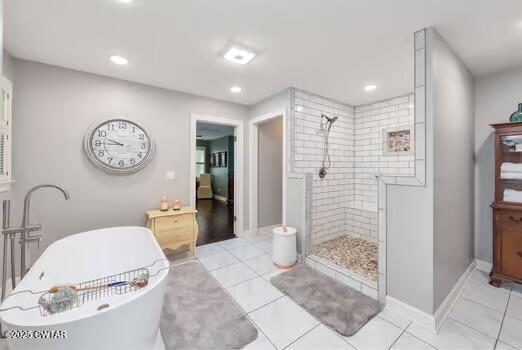 562 Old Jackson Road Henderson, TN 38340 - Photo 23 of 42 a spacious bathroom with a double vanity sink and a mirror