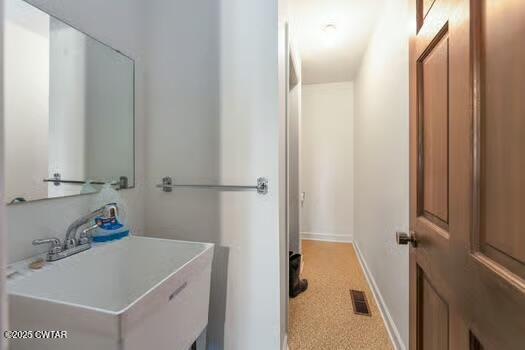 562 Old Jackson Road Henderson, TN 38340 - Photo 24 of 42 a bathroom with a tub and sink