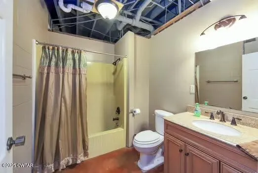 a view of a room with a hallway