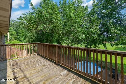 562 Old Jackson Road Henderson, TN 38340 - Photo 42 of 42 a balcony with trees in front of it