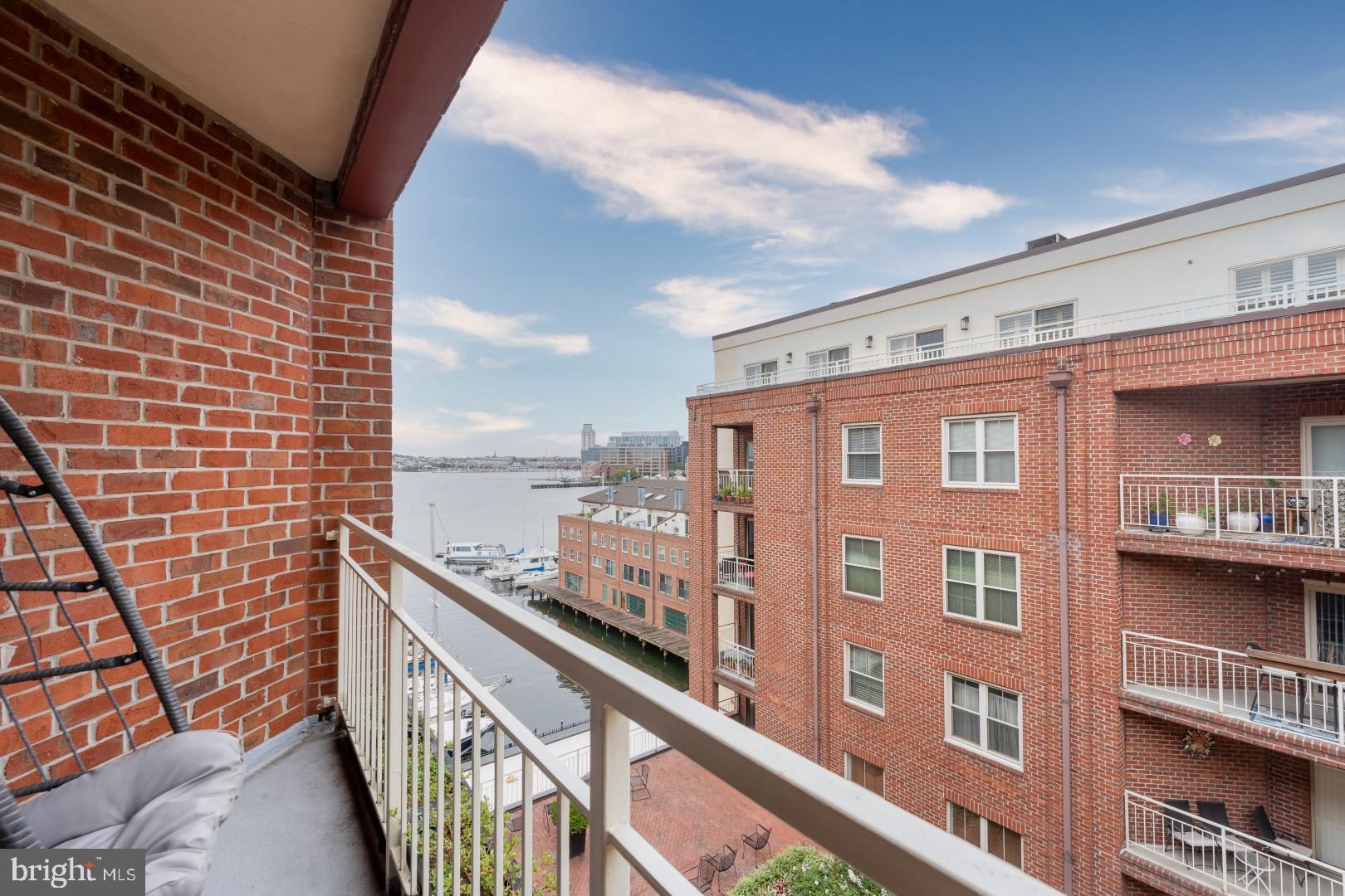 960 Fell Street, Unit 603 Baltimore, MD 21231 - Photo 17 of 24 a view of a building from a balcony