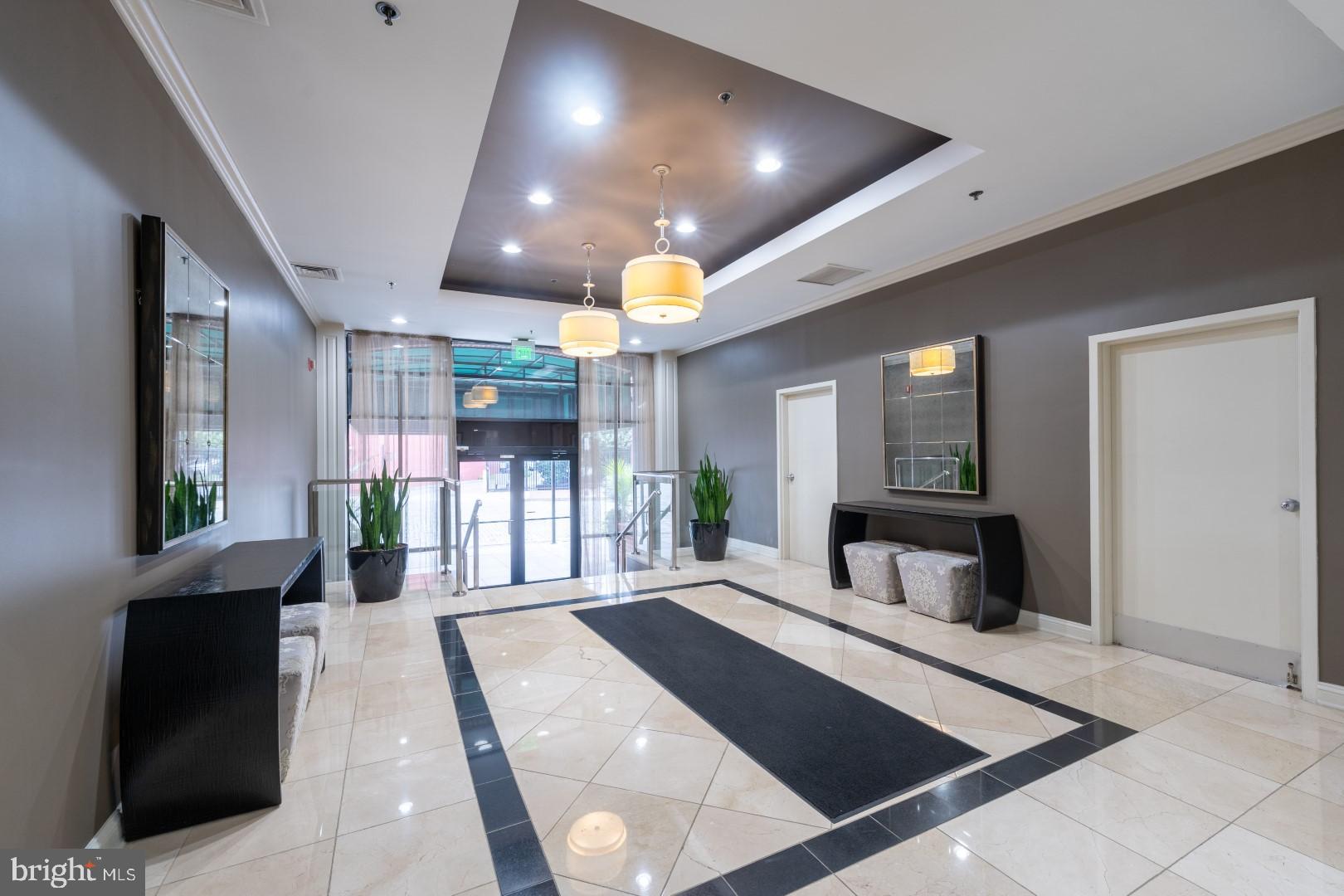 960 Fell Street, Unit 603 Baltimore, MD 21231 - Photo 23 of 24 a living room with furniture and a large window