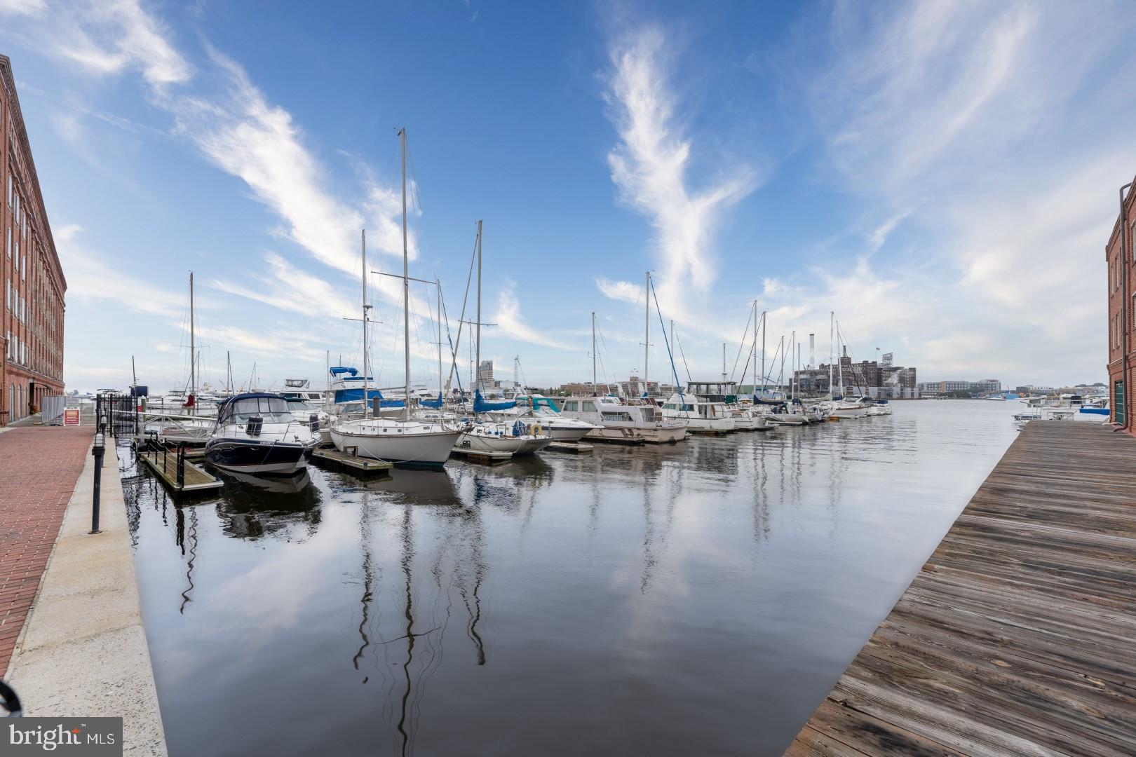 960 Fell Street, Unit 603 Baltimore, MD 21231 - Photo 24 of 24 a view of a lake with boats and trees