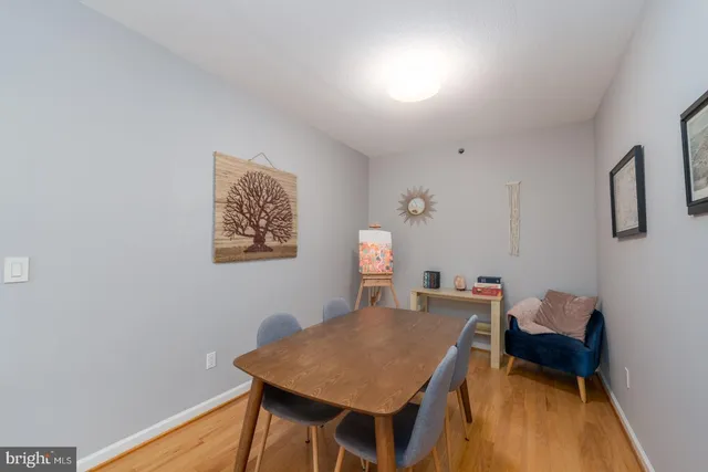 a bed room with a bed and a table in it