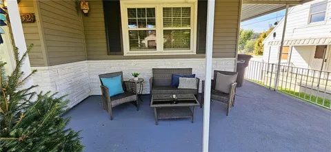 a building outdoor space with patio furniture