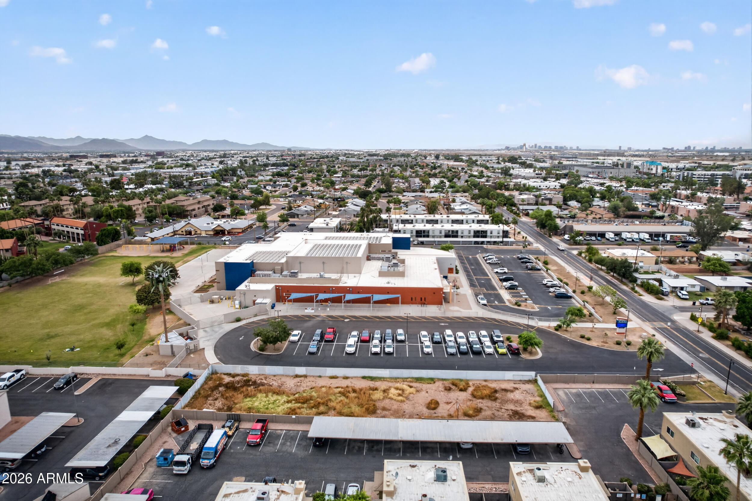 1063 West 5th Street, Unit 3 Tempe, AZ 85281 - Photo 9 of 10 an aerial view of residential houses with outdoor space