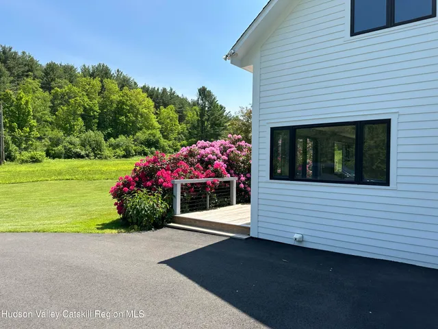 a view of a house with a big yard