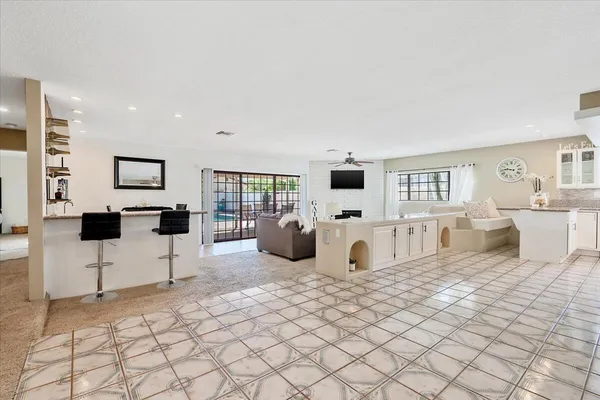 a living room with furniture and view of living room