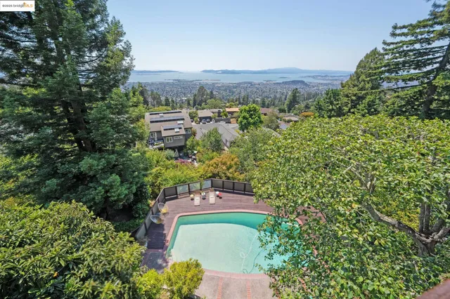 a view of livingroom with furniture and floor to ceiling window