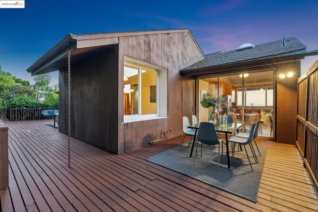 a view of a chairs and table on the wooden floor