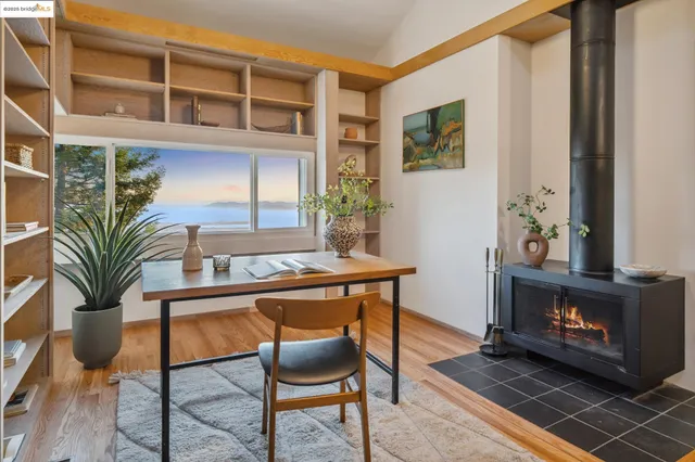 a room with furniture and a fireplace