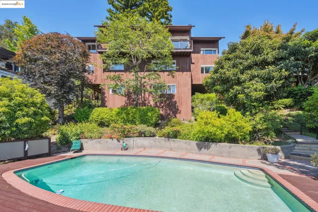 a view of kitchen with furniture and window