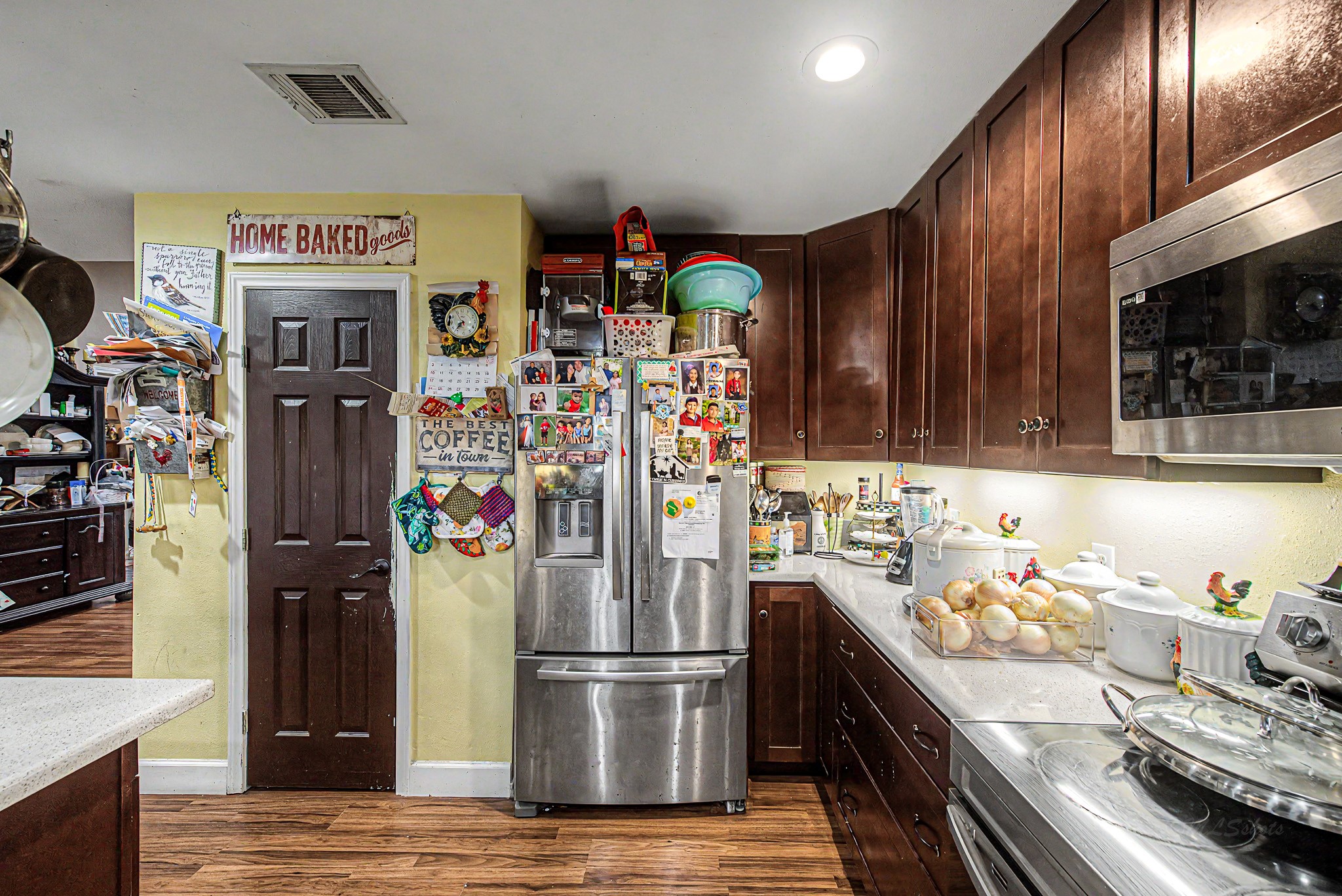 29867 Marti Road Katy, TX 77493 - Photo 19 of 36 a kitchen with refrigerator and cabinets