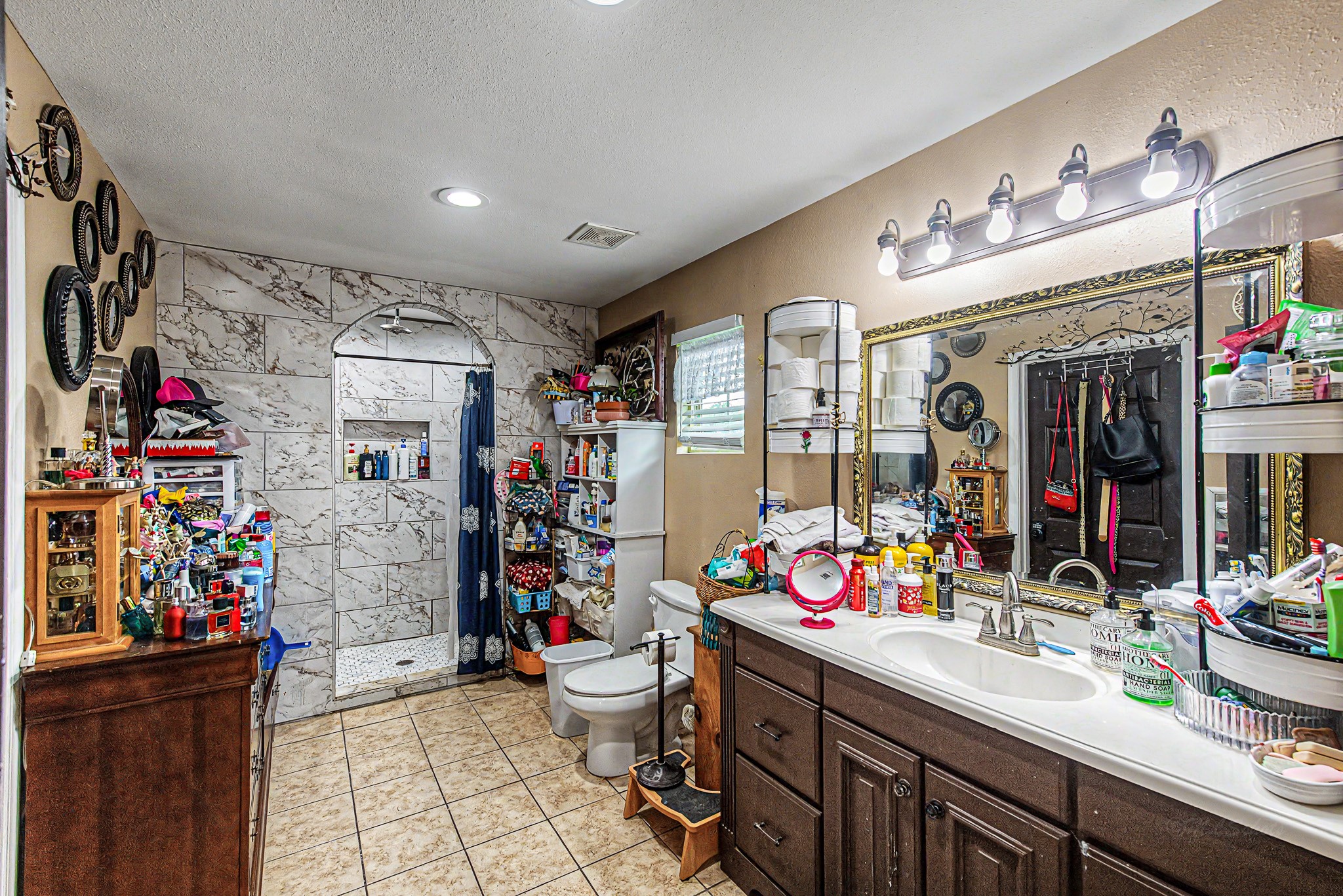 29867 Marti Road Katy, TX 77493 - Photo 22 of 36 a kitchen that has a lot of stuff and cabinets