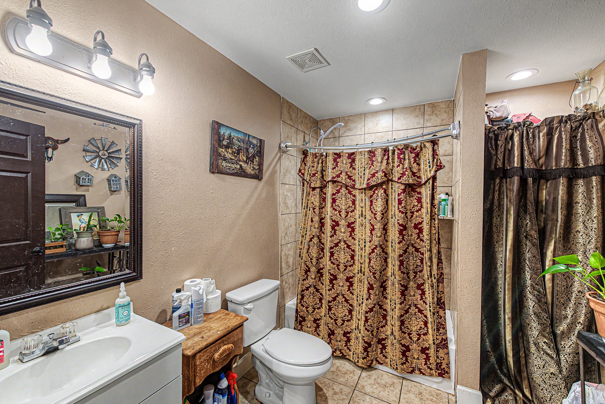 29867 Marti Road Katy, TX 77493 - Photo 24 of 36 a bathroom with a sink toilet and shower