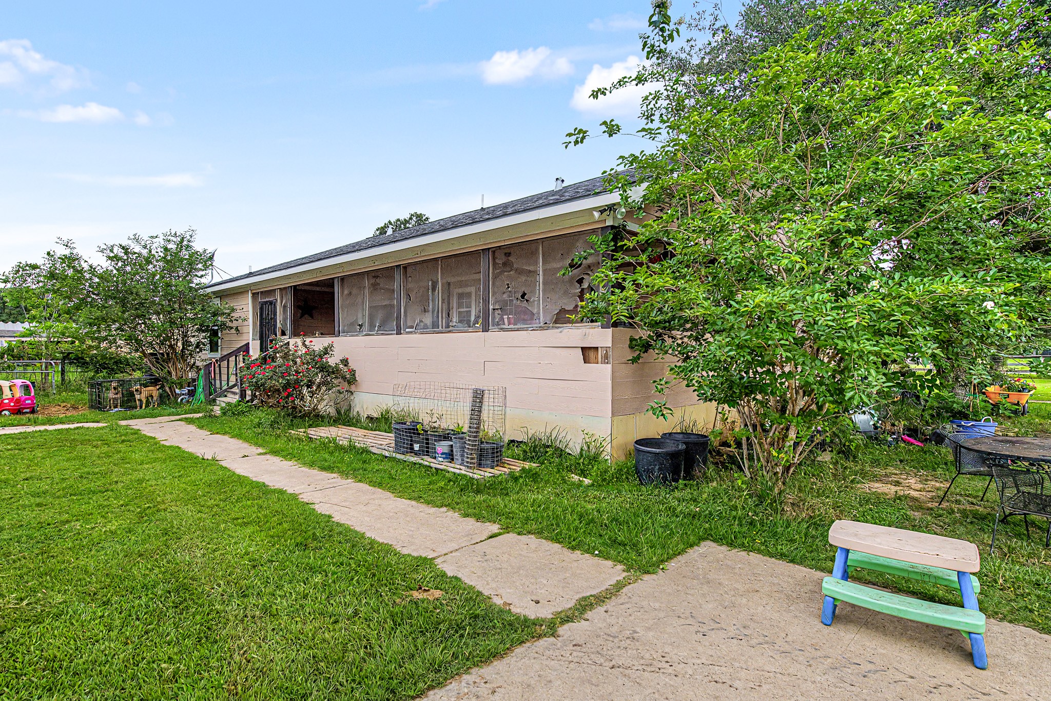 29867 Marti Road Katy, TX 77493 - Photo 25 of 36 a front view of house with a garden