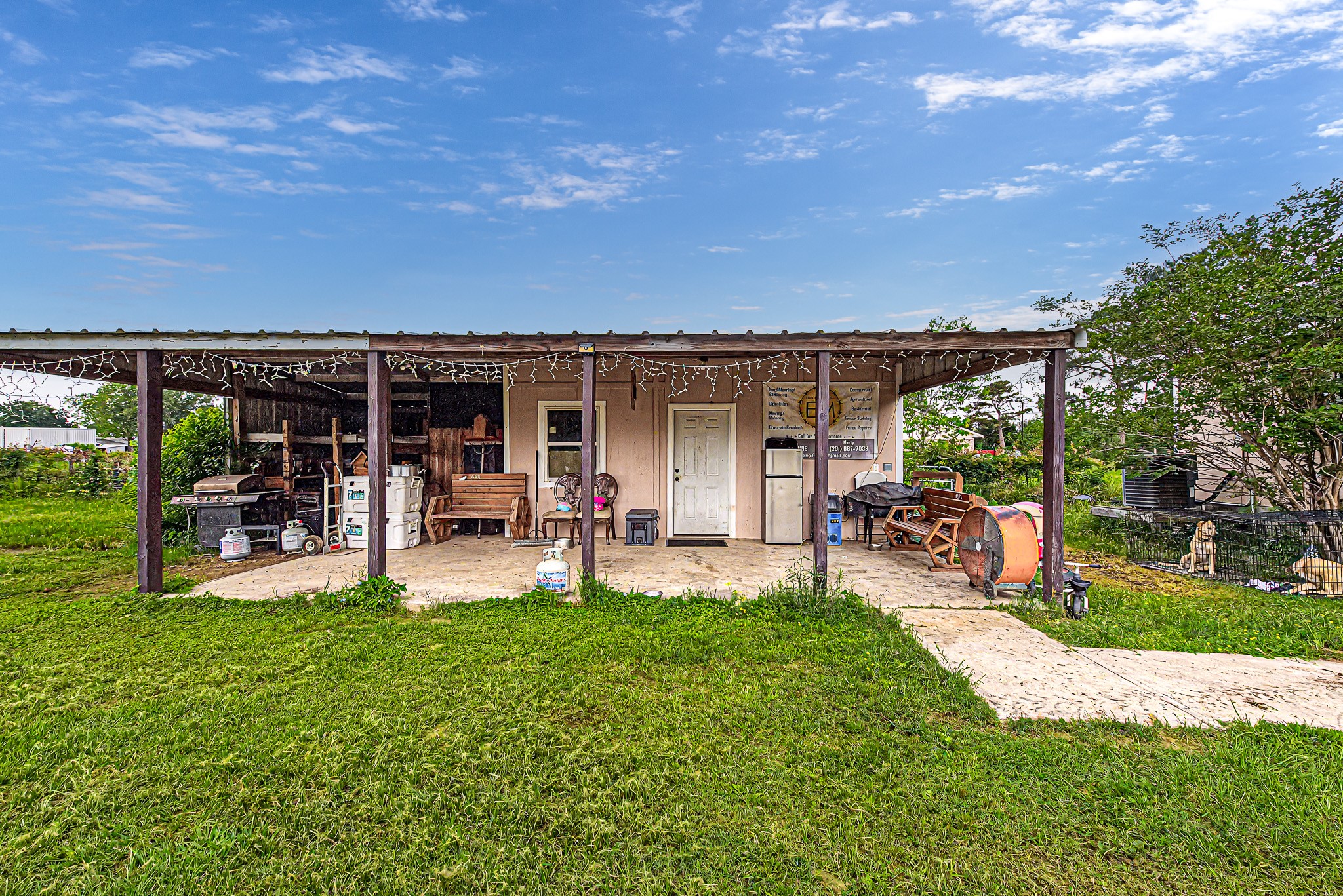 29867 Marti Road Katy, TX 77493 - Photo 30 of 36 a view of a house with backyard porch and sitting area