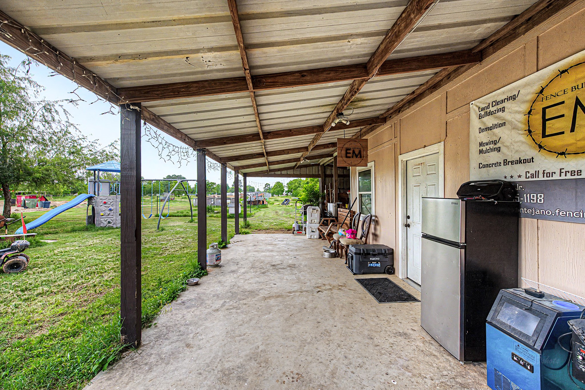 29867 Marti Road Katy, TX 77493 - Photo 31 of 36 a view of a garage with wooden floor