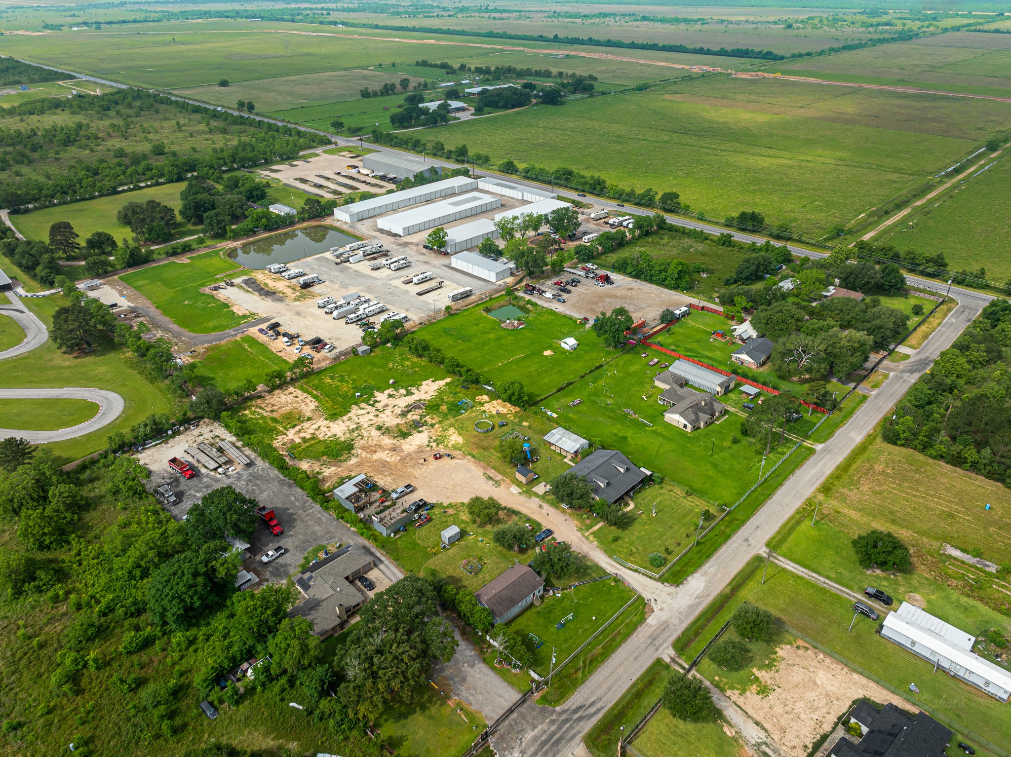 29867 Marti Road Katy, TX 77493 - Photo 10 of 36 a view of a lake with a big yard