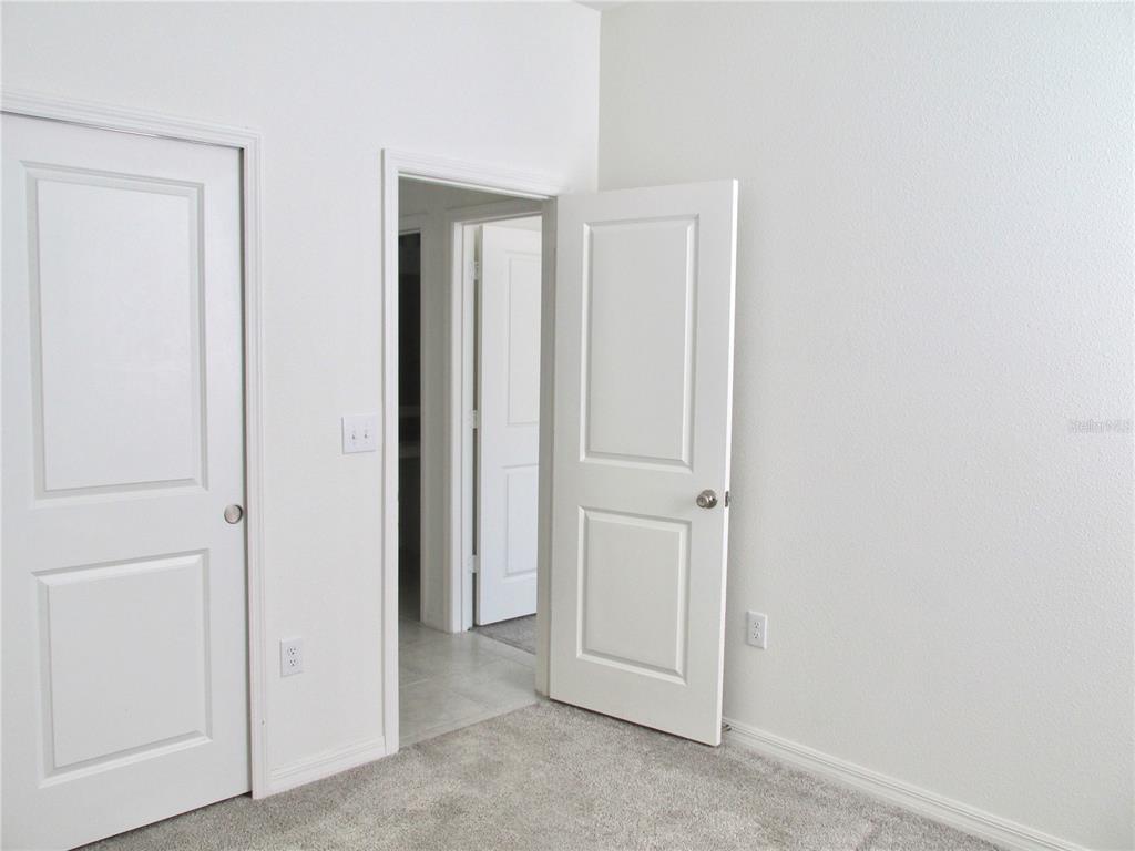 9023 Hooton Way Davenport, FL 33896 - Photo 20 of 25 an empty room with closet