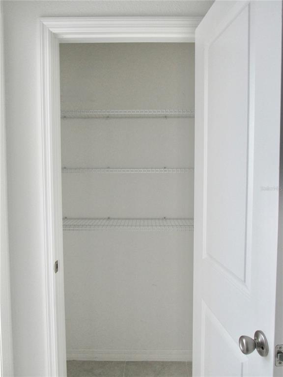 9023 Hooton Way Davenport, FL 33896 - Photo 24 of 25 a view of a closet