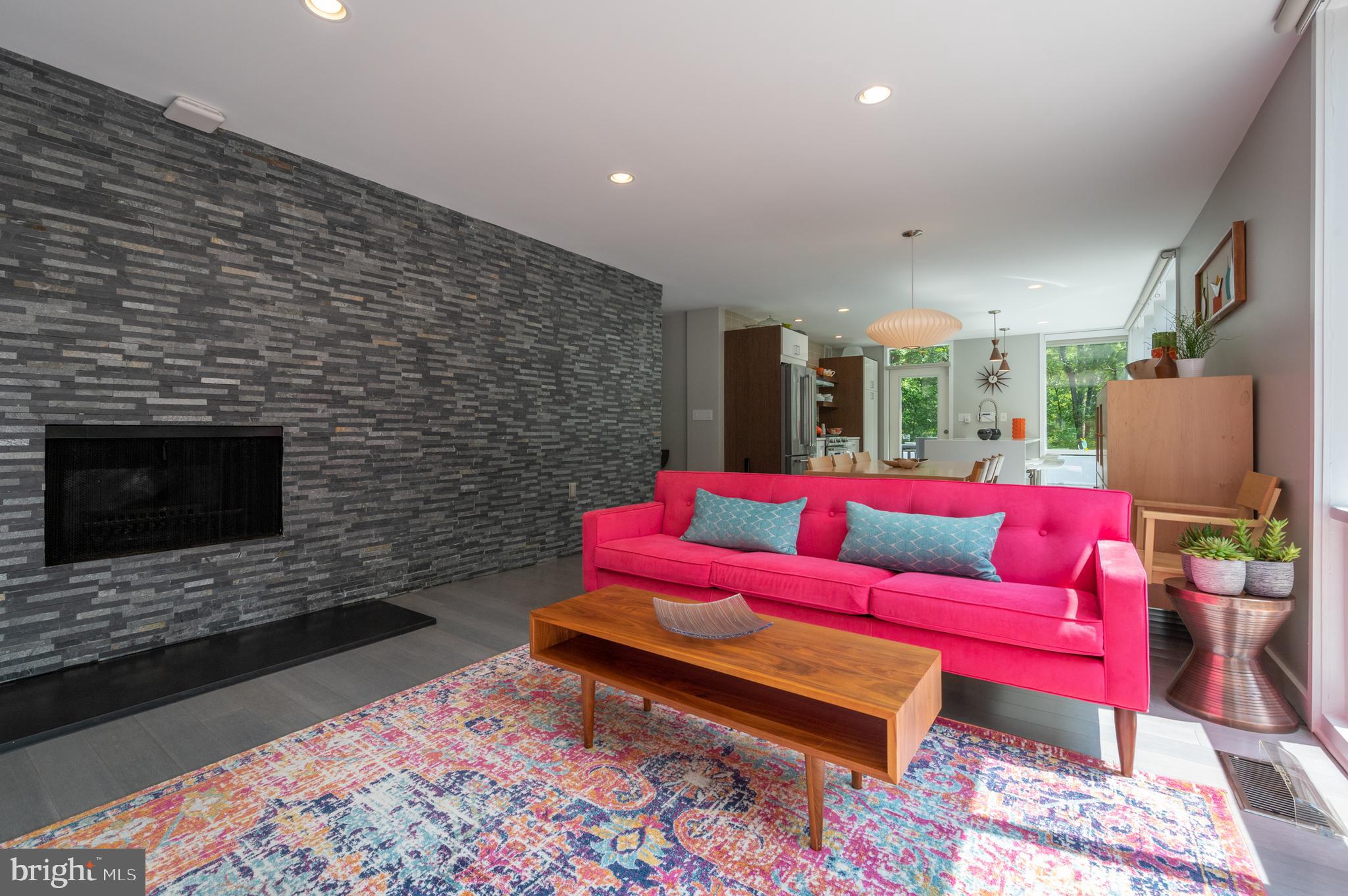 7213 Beechwood Road Alexandria, VA 22307 - Photo 16 of 48 Wall of stacked stone and wood burning Fireplace