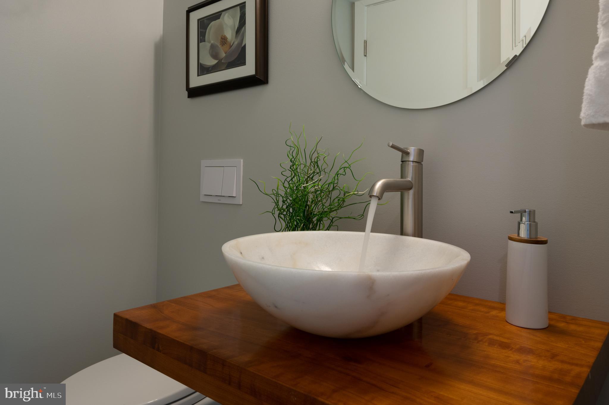 7213 Beechwood Road Alexandria, VA 22307 - Photo 33 of 48 Hallway Half Bath with additional linen closet