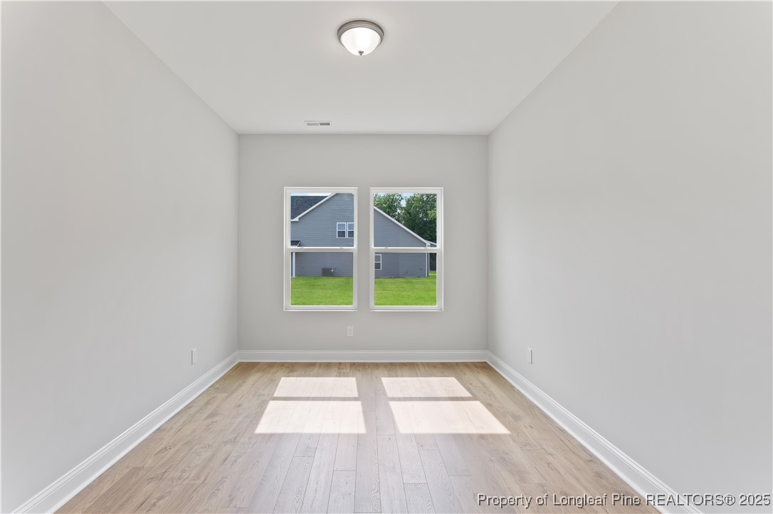 3117 Wolfpack Lane Eastover, NC 28312 - Photo 15 of 45 an empty room with a window