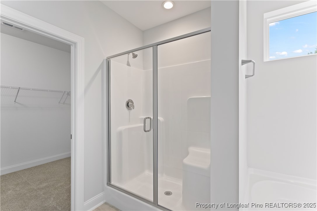 3117 Wolfpack Lane Eastover, NC 28312 - Photo 30 of 45 a bathroom with a shower