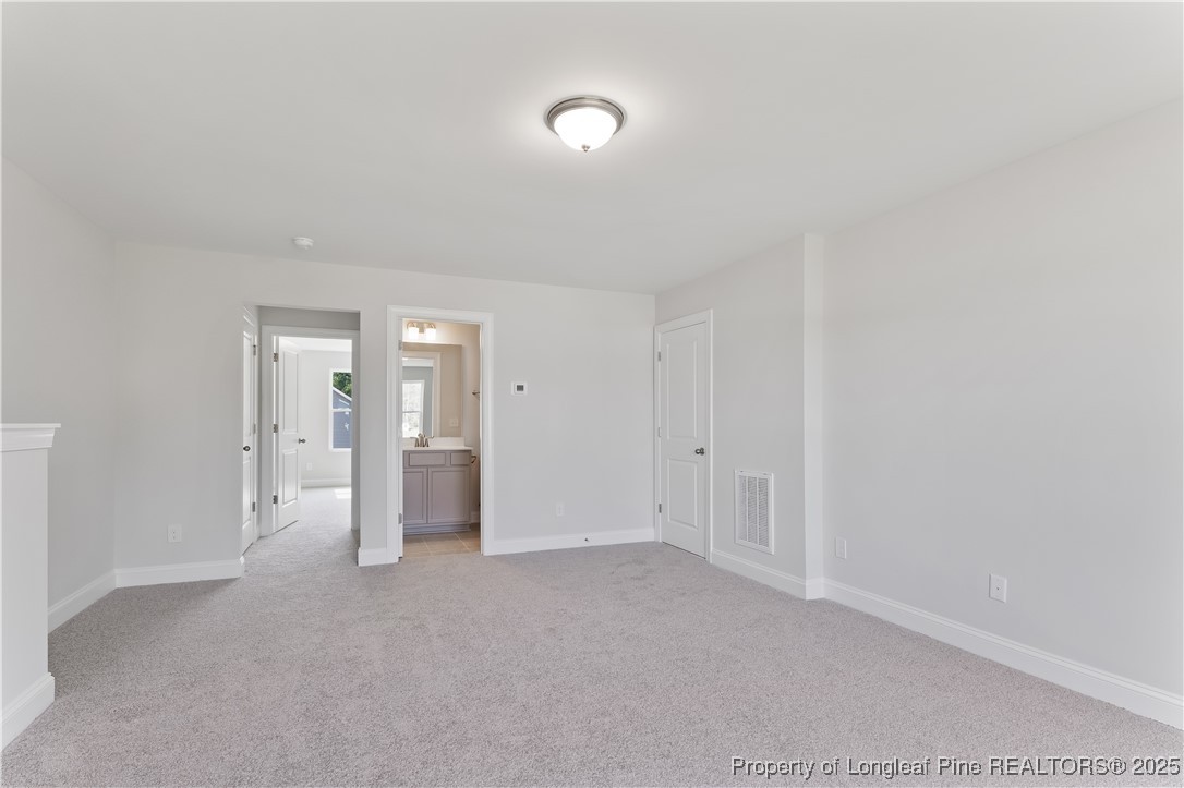 3117 Wolfpack Lane Eastover, NC 28312 - Photo 35 of 45 a view of an empty room