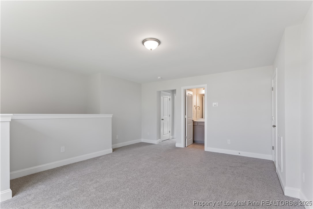 3117 Wolfpack Lane Eastover, NC 28312 - Photo 36 of 45 a view of an empty room