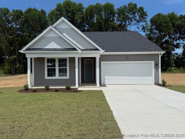 3117 Wolfpack Lane Eastover, NC 28312 - Photo 41 of 45 a front view of a house with a yard