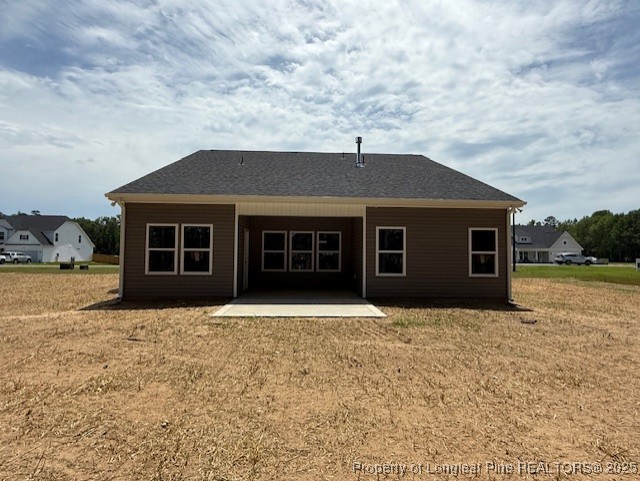 3117 Wolfpack Lane Eastover, NC 28312 - Photo 42 of 45 a front view of a house with a yard