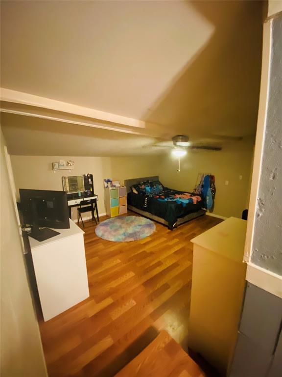 1670 Shiloh Street Paris, TX 75460 - Photo 10 of 11 Bedroom featuring wood finished floors