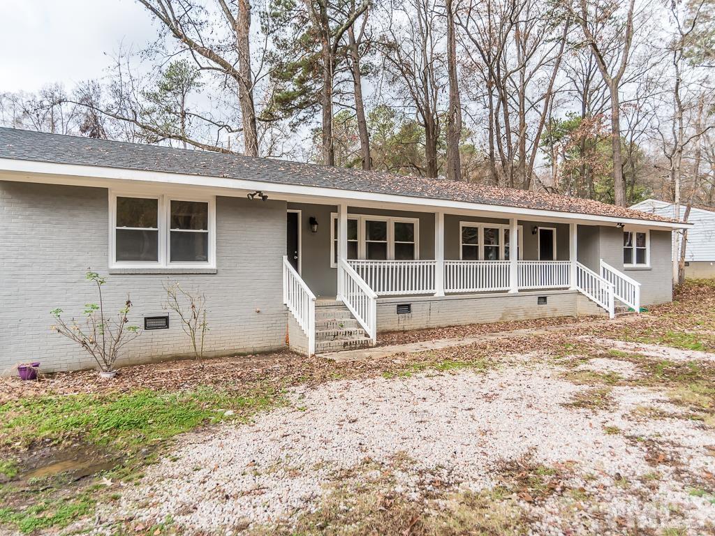 512 Dacian Road Raleigh, NC 27610 - Photo 1 of 19 a front view of a house with a yard