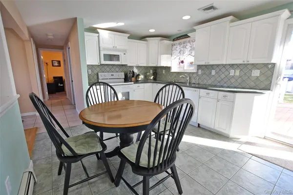 $559,000 | 359 Randall Road, Ridge, NY 11961