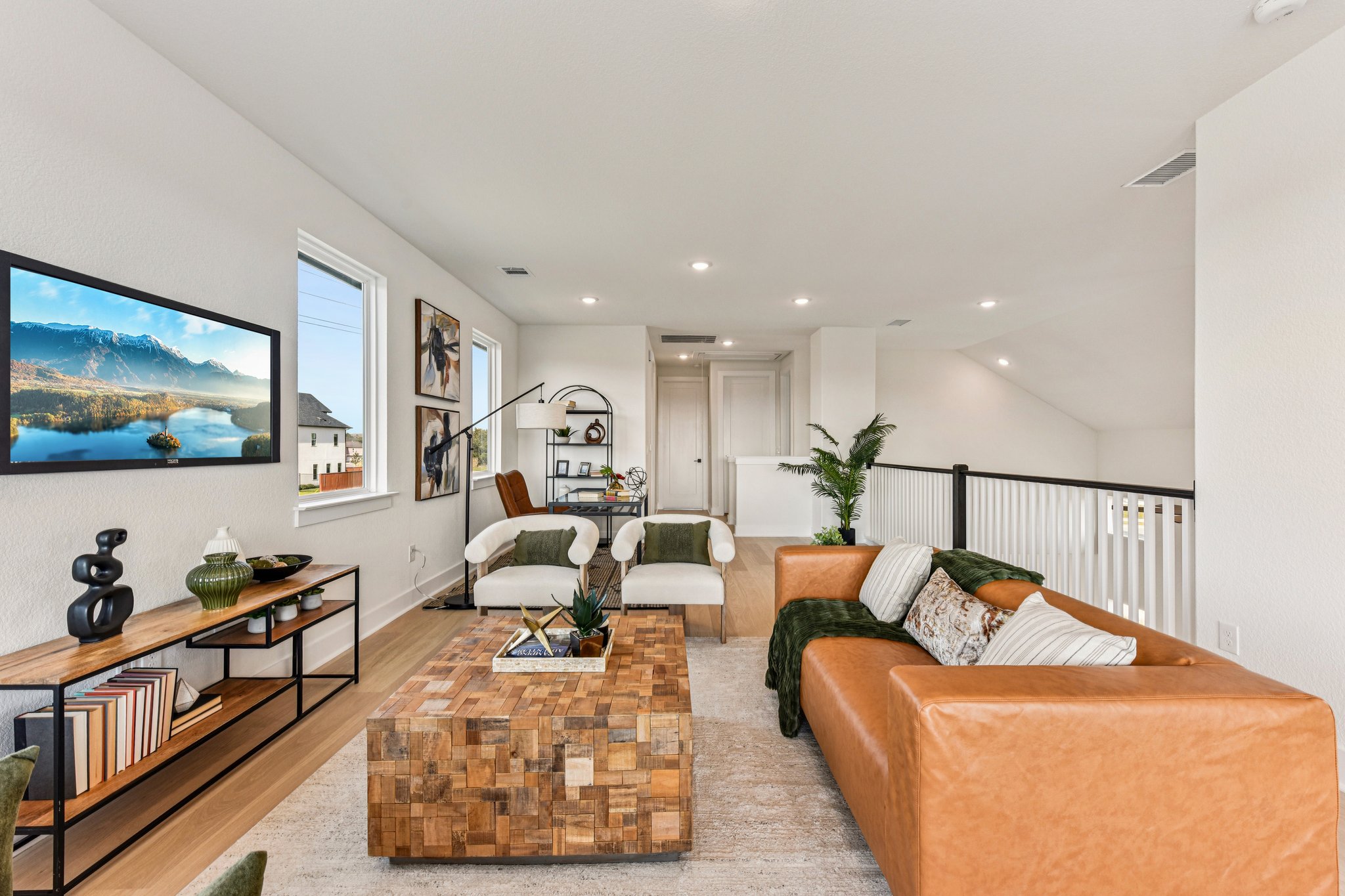 12105 Cearley Drive Austin, TX 78758 - Photo 22 of 40 a living room with furniture and a flat screen tv