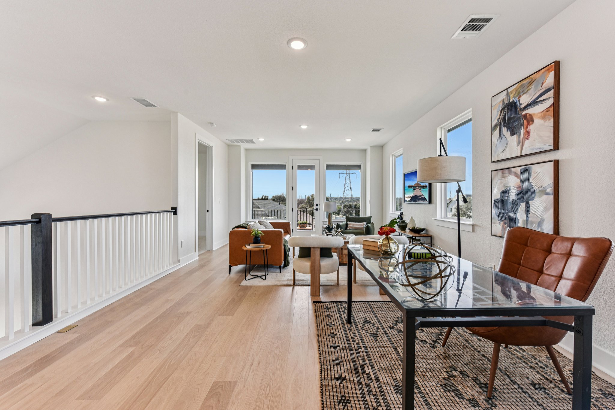 12105 Cearley Drive Austin, TX 78758 - Photo 24 of 40 a view of a dining room with furniture and a potted plant