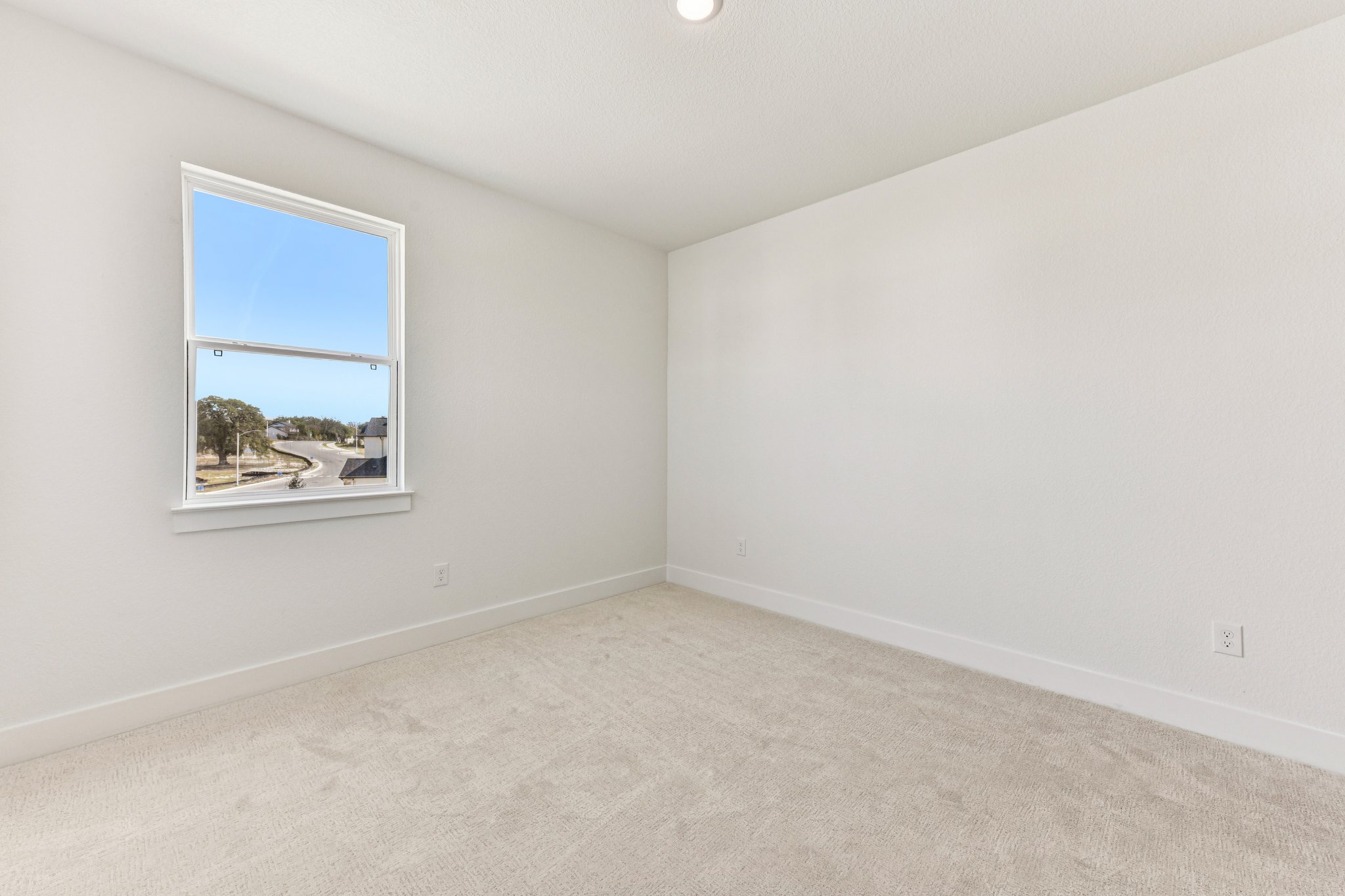 12105 Cearley Drive Austin, TX 78758 - Photo 29 of 40 an empty room with windows