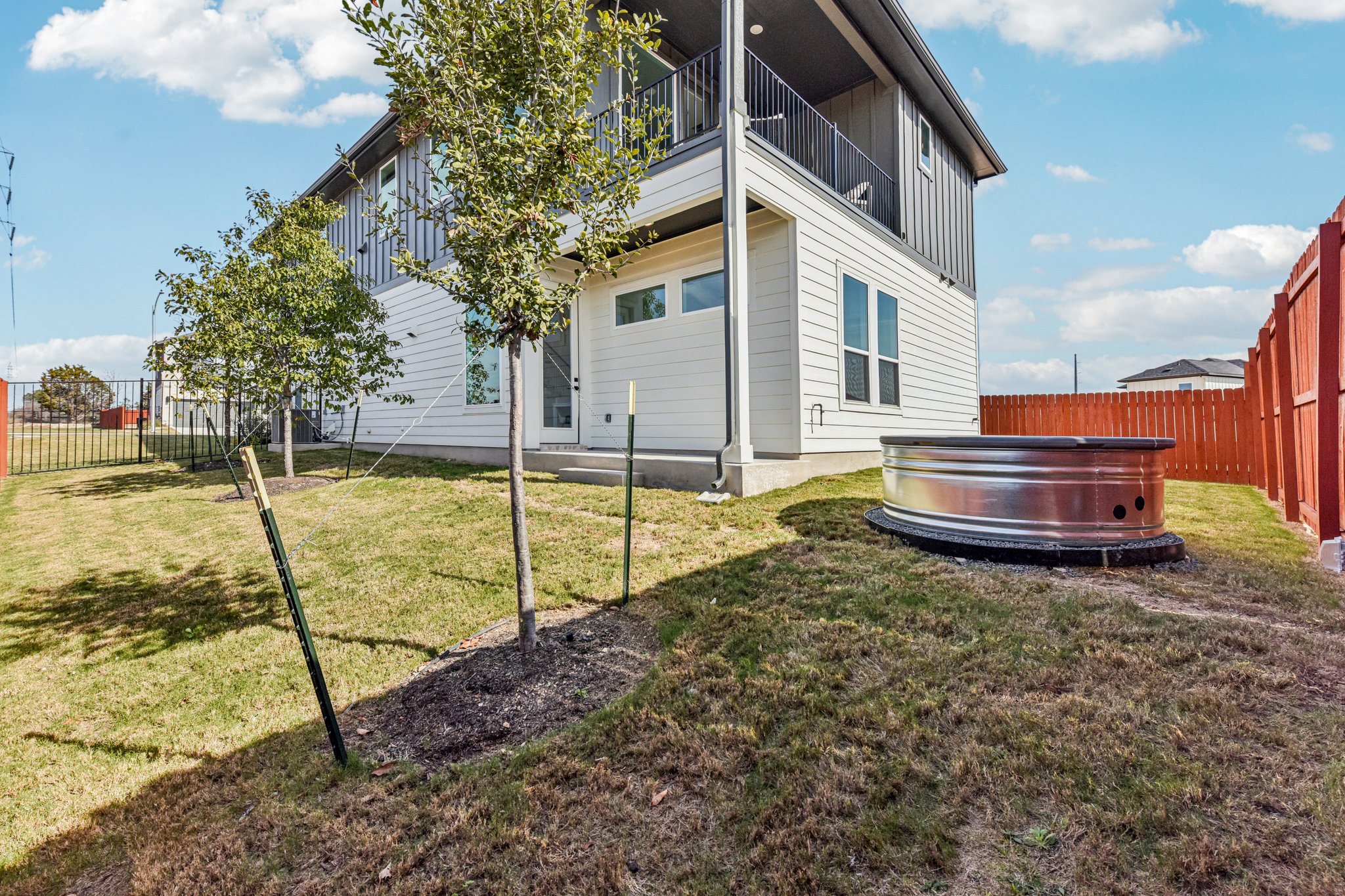 12105 Cearley Drive Austin, TX 78758 - Photo 35 of 40 a view of a house with backyard and sitting area