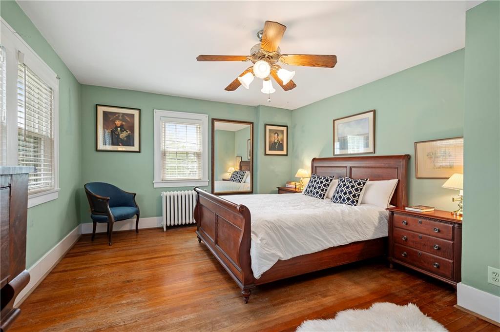 212 Pine Road Sewickley, PA 15143 - Photo 18 of 33 The primary bedroom features multiple windows for natural light and a layout that easily accommodates a full suite of furnishings.